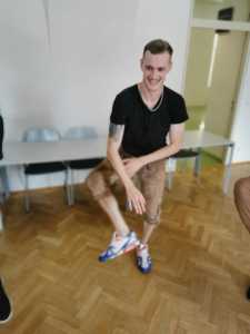 Studierender beim Schuhplattln/Volkstanzen
